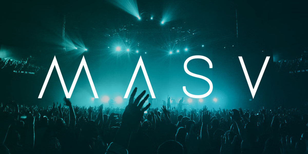 masv-concert-open-graph Une image de fans assistant à un concert avec le logo MASV superposé.