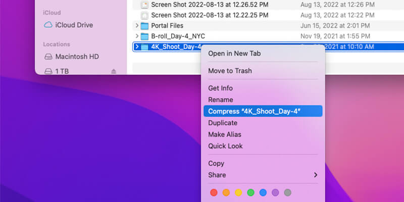 send-large-files-zipping Une souris survolant l'option de compression sur MacOS
