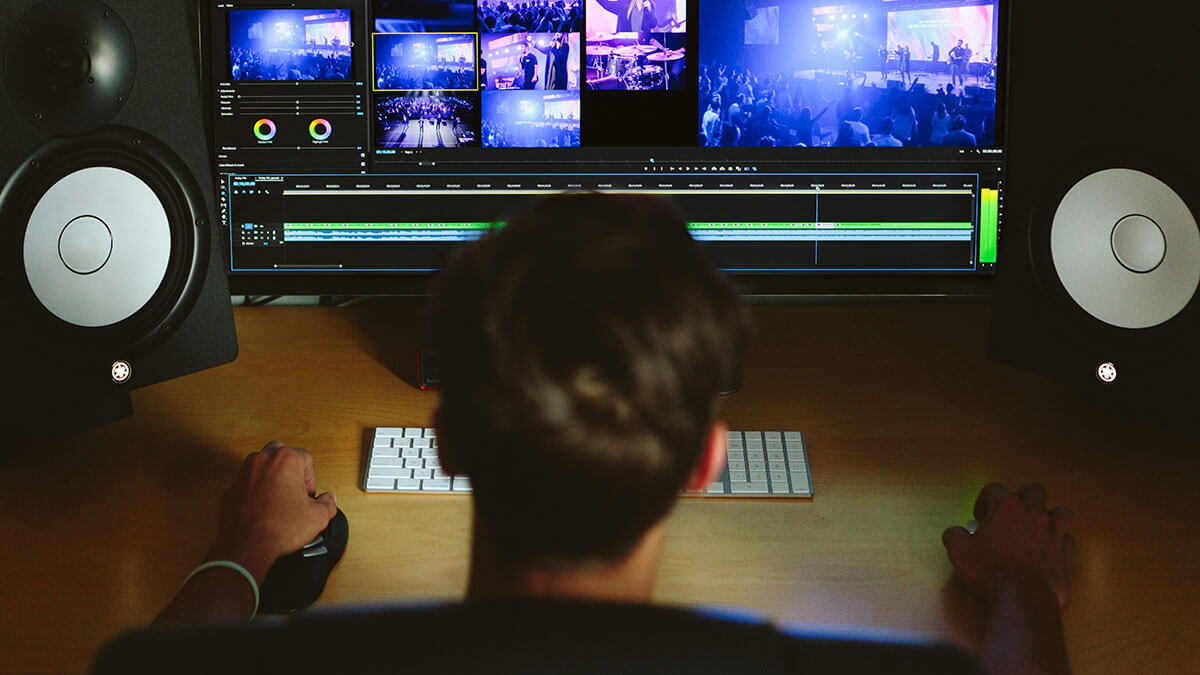 video-editor-working-premiere-pro-desktop Video-editor-working-in-Adobe-Premiere-Pro-on-desktop