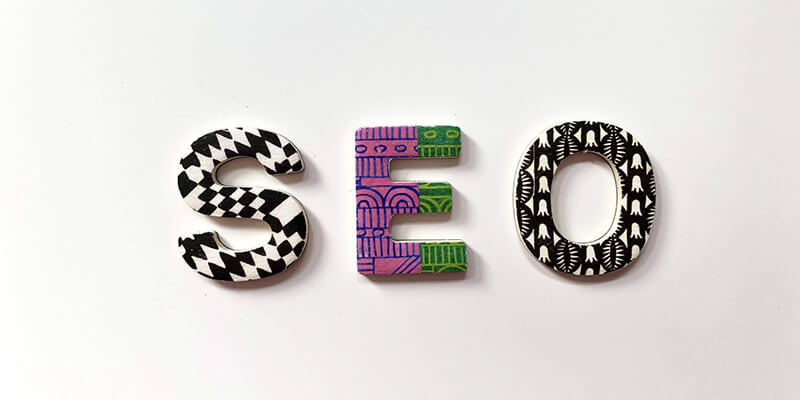 Video SEO_SEO graphic SEO spelled out on a white canvas
